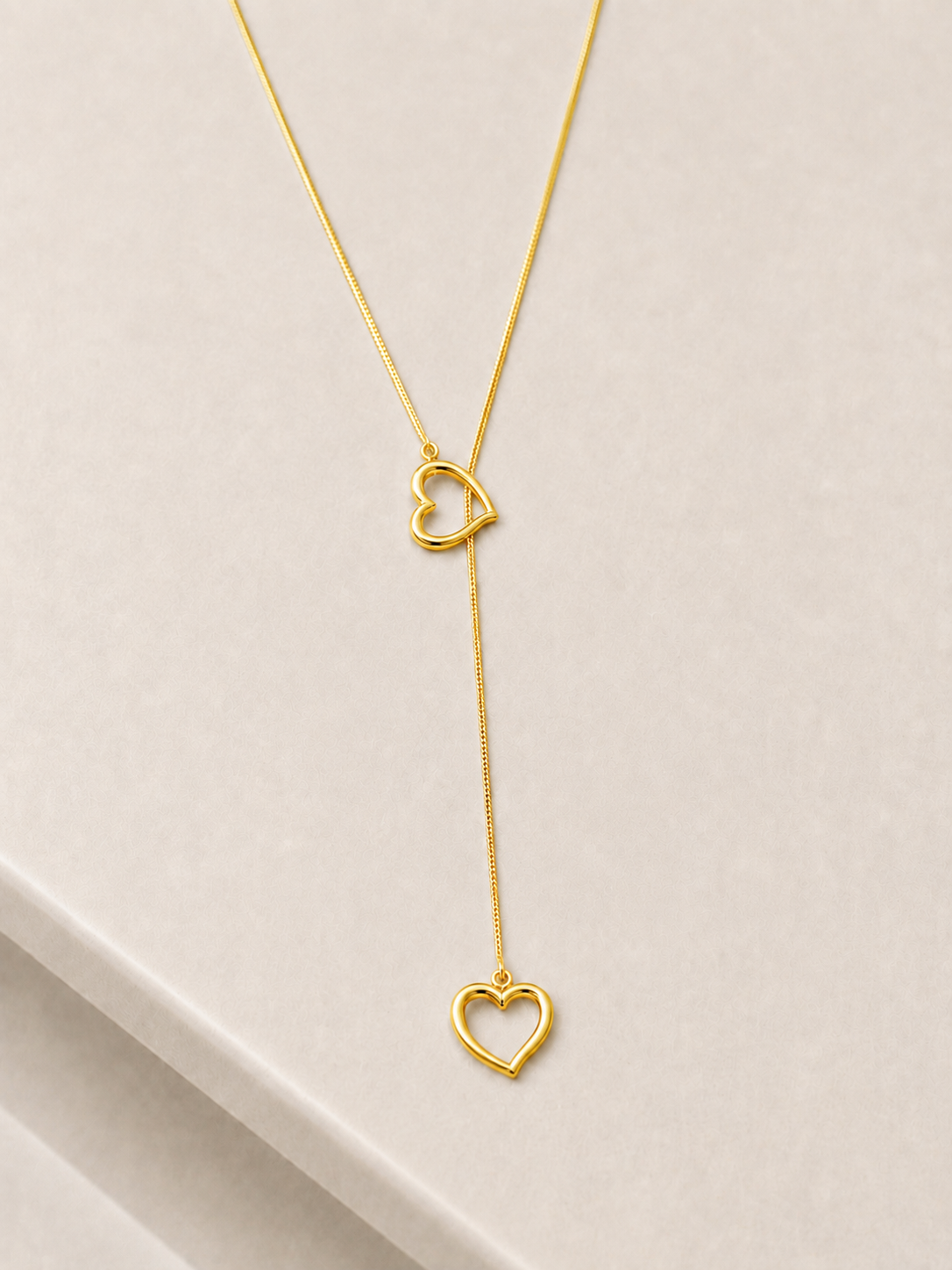 Collar largo corazón dorado