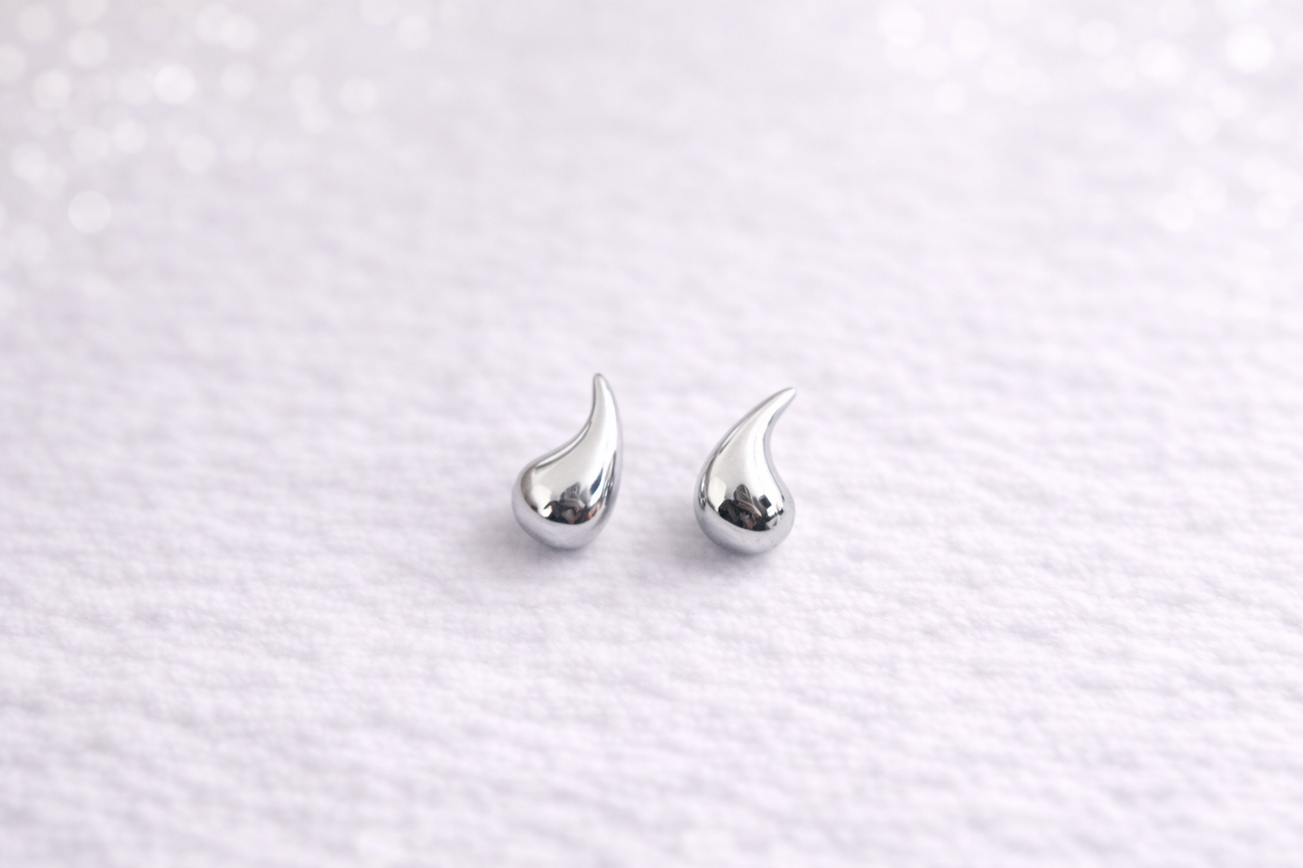 Topo pequeño gota plateado