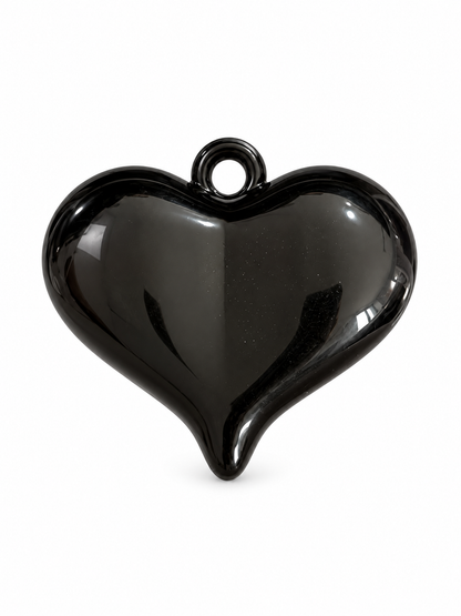 Dije maxi corazón negro.