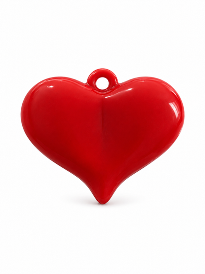 Dije maxi corazón rojo.