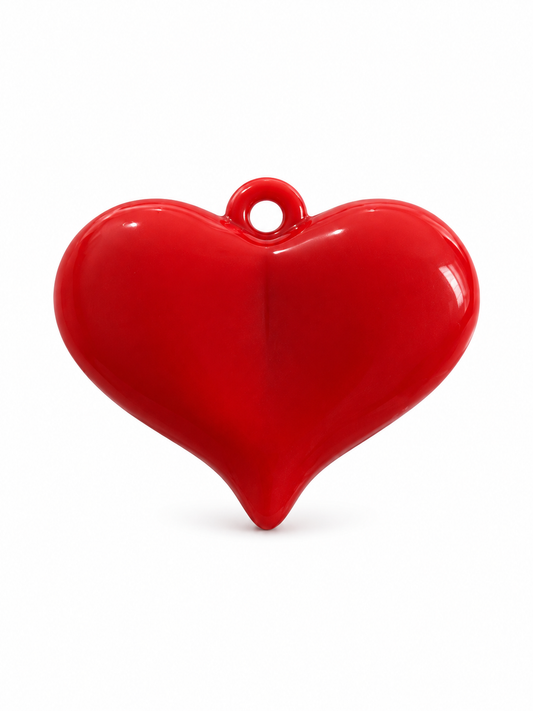 Dije maxi corazón rojo.
