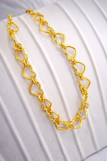 Collar corazones enlazados dorado