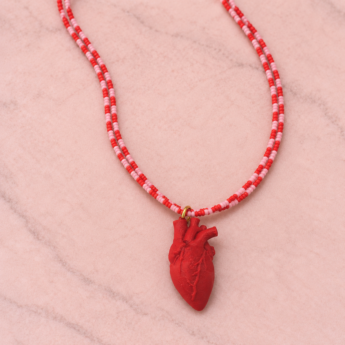 Collar corazón anatómico