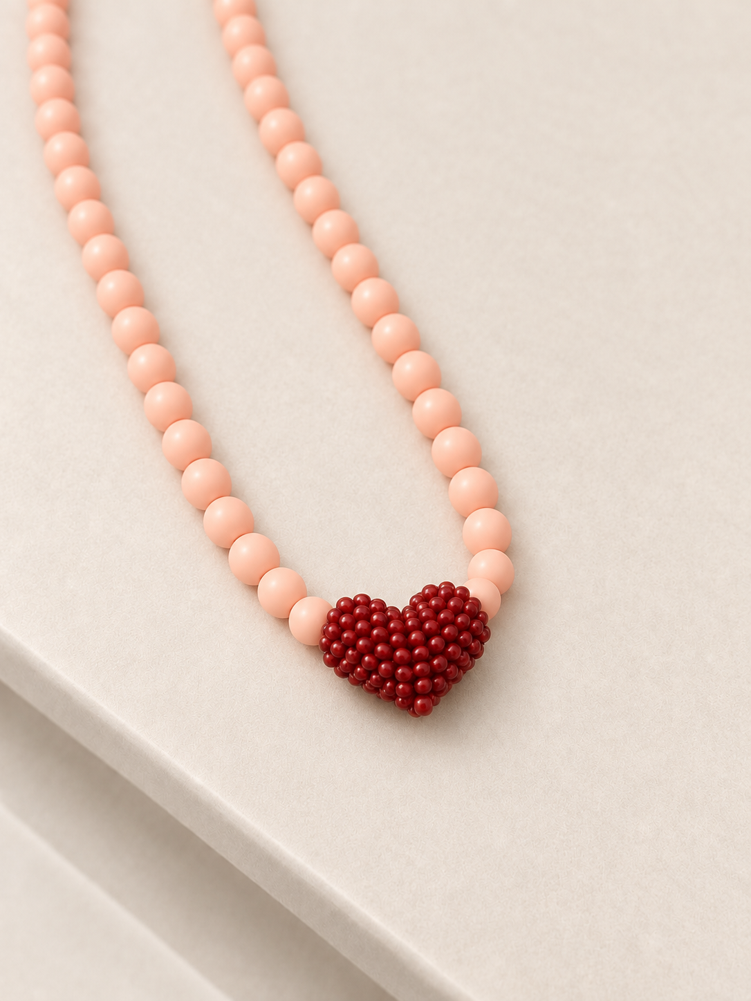 Collar chunk corazón tejido