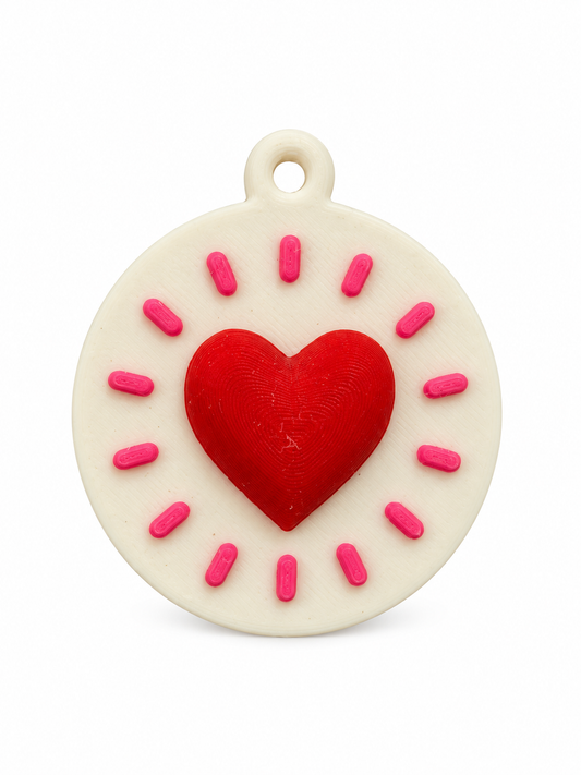 Dije moneda corazón rojo