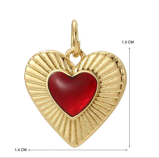 Dije corazón dorado y rojo