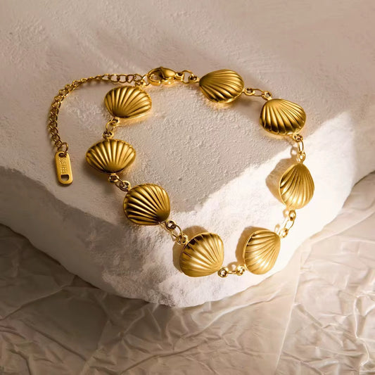 Pulsera conchas